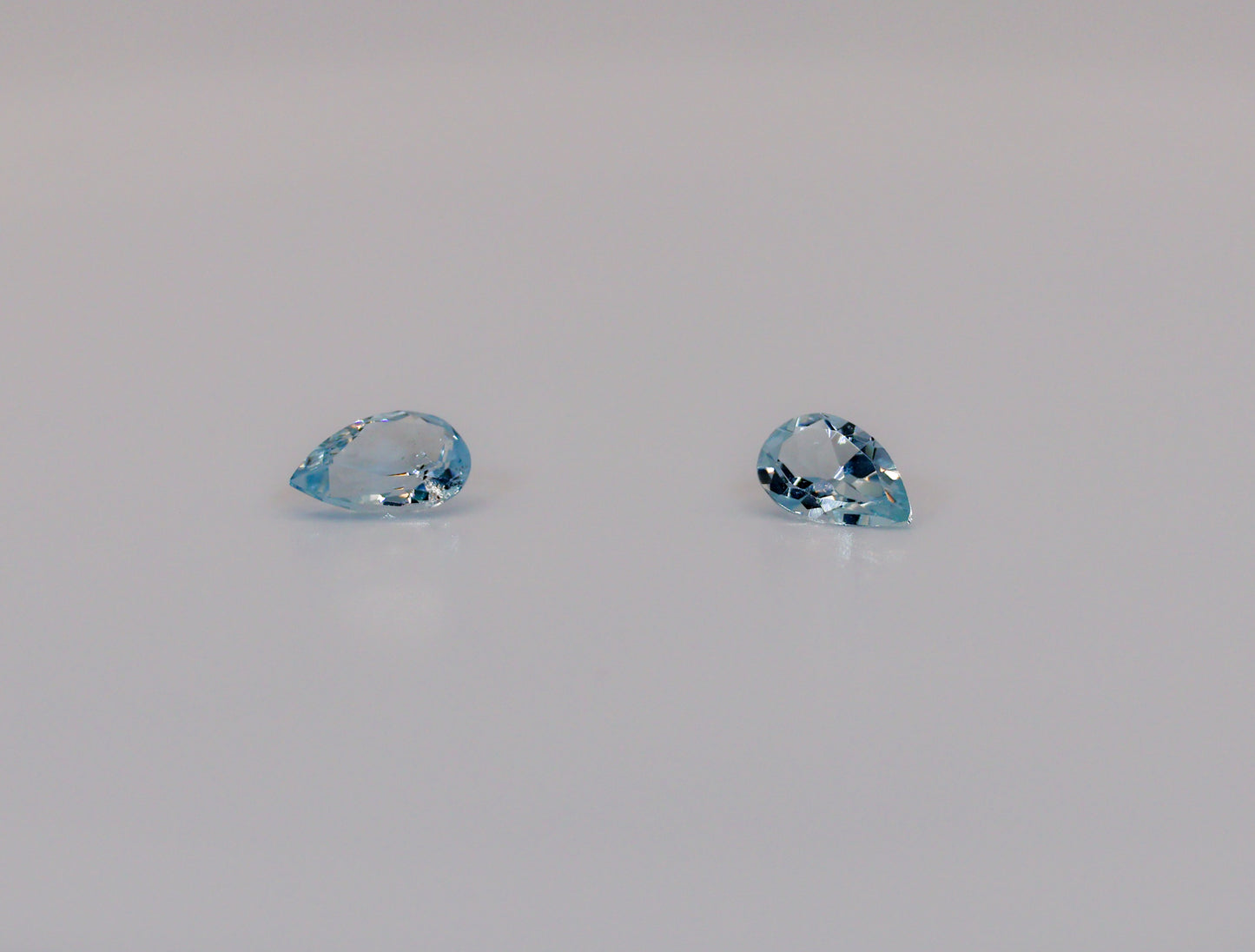 Aquamarine match pair pear shape 1.35cts total