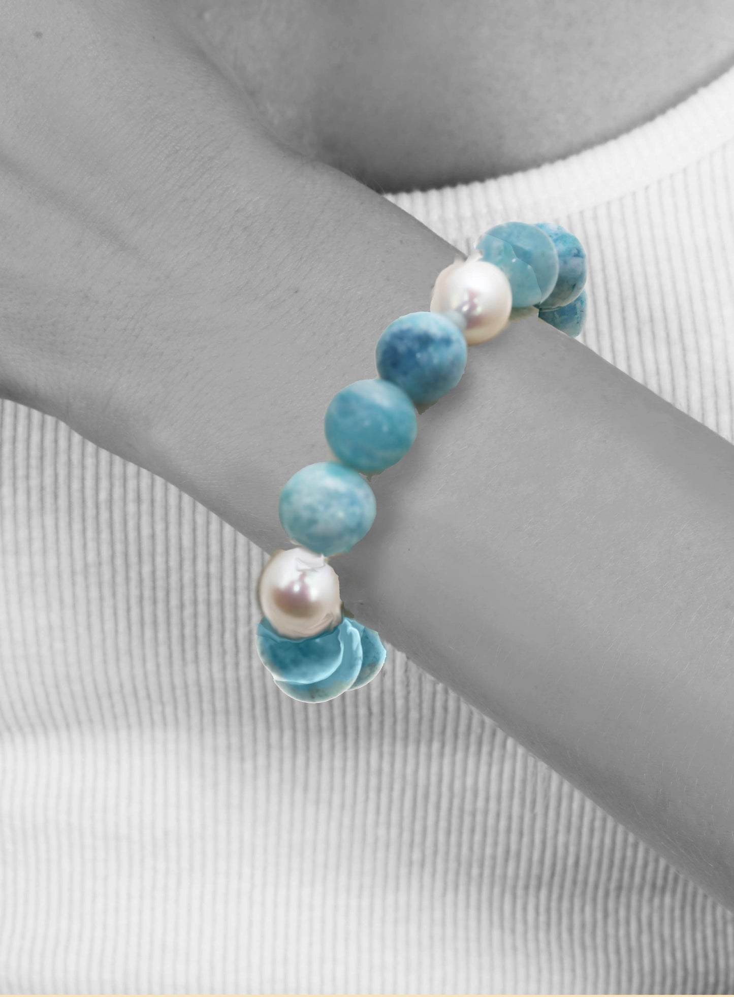 Smooth amazonite ball, small white baroque pearl, 7.5” stretch