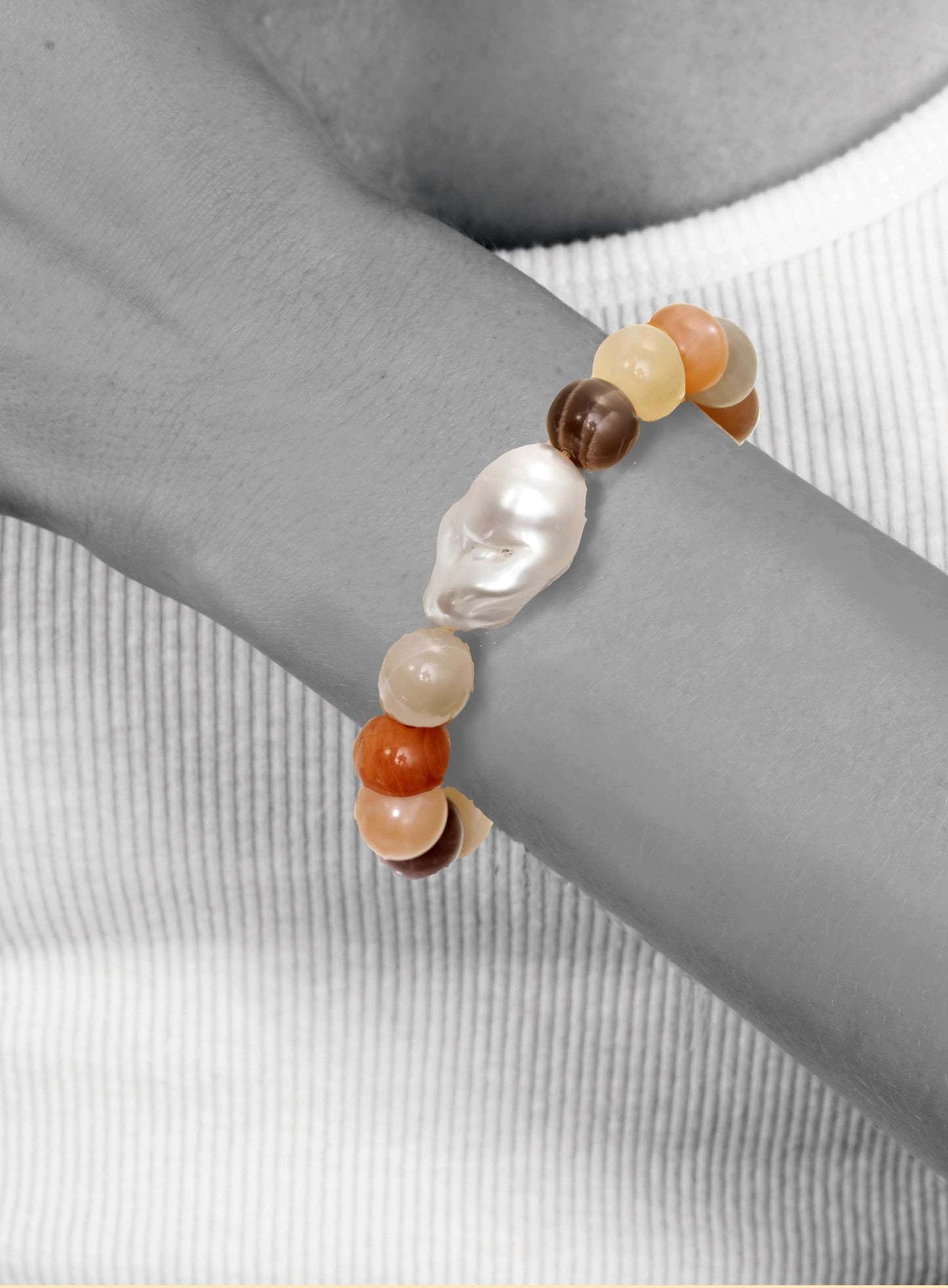 Multi-color moonstone, white baroque pearl, 7.25” stretch