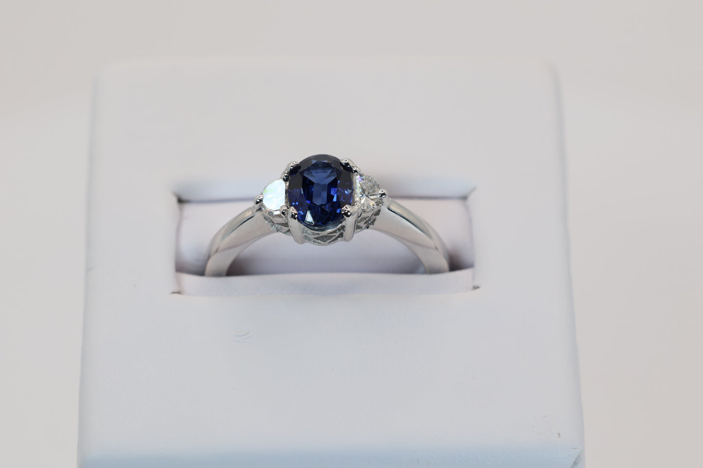 Oval Sapphire Ring with Half-Moon Crescent Diamonds
