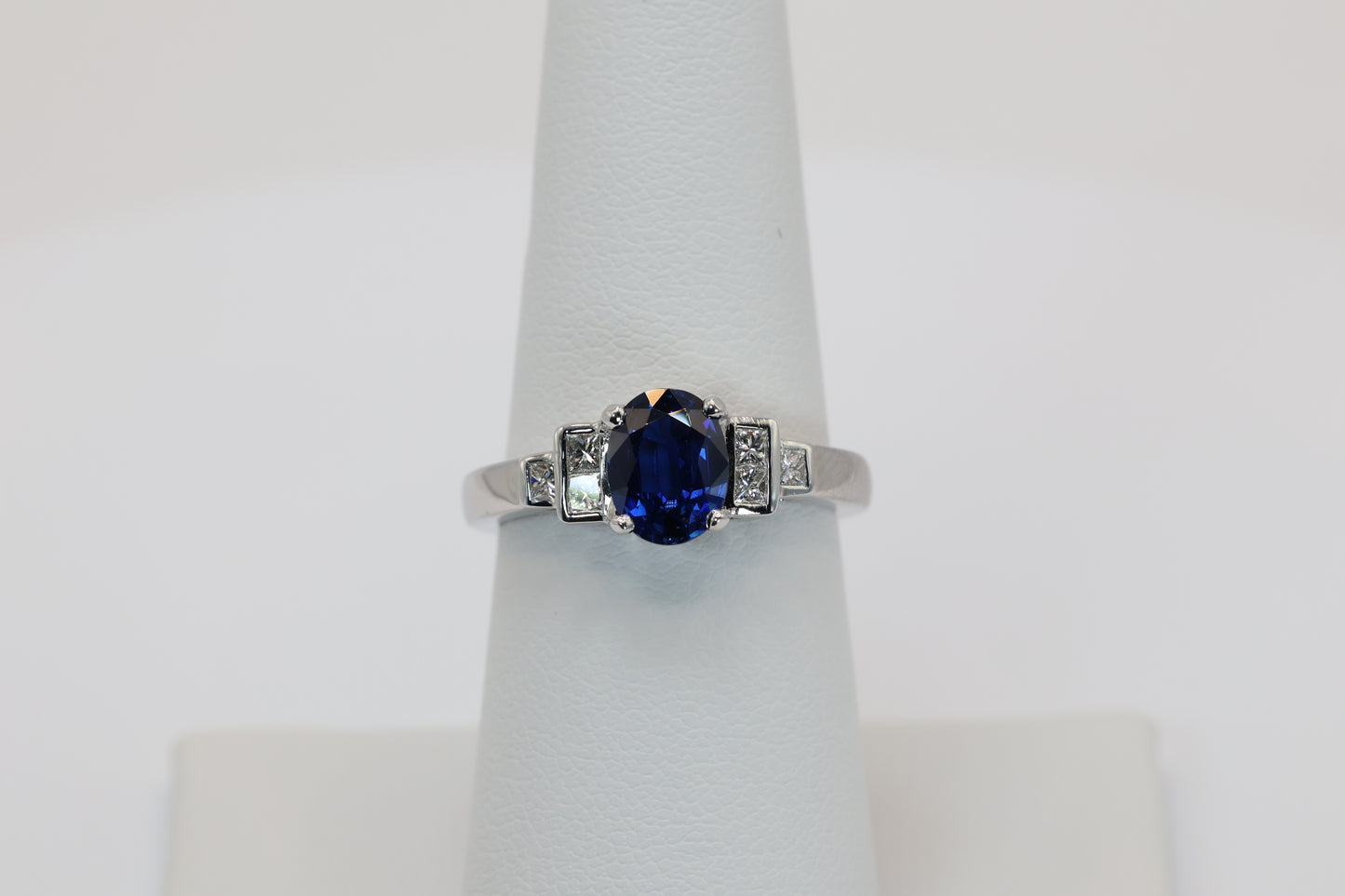 Oval Sapphire Ring with Step-Down Diamond Accents